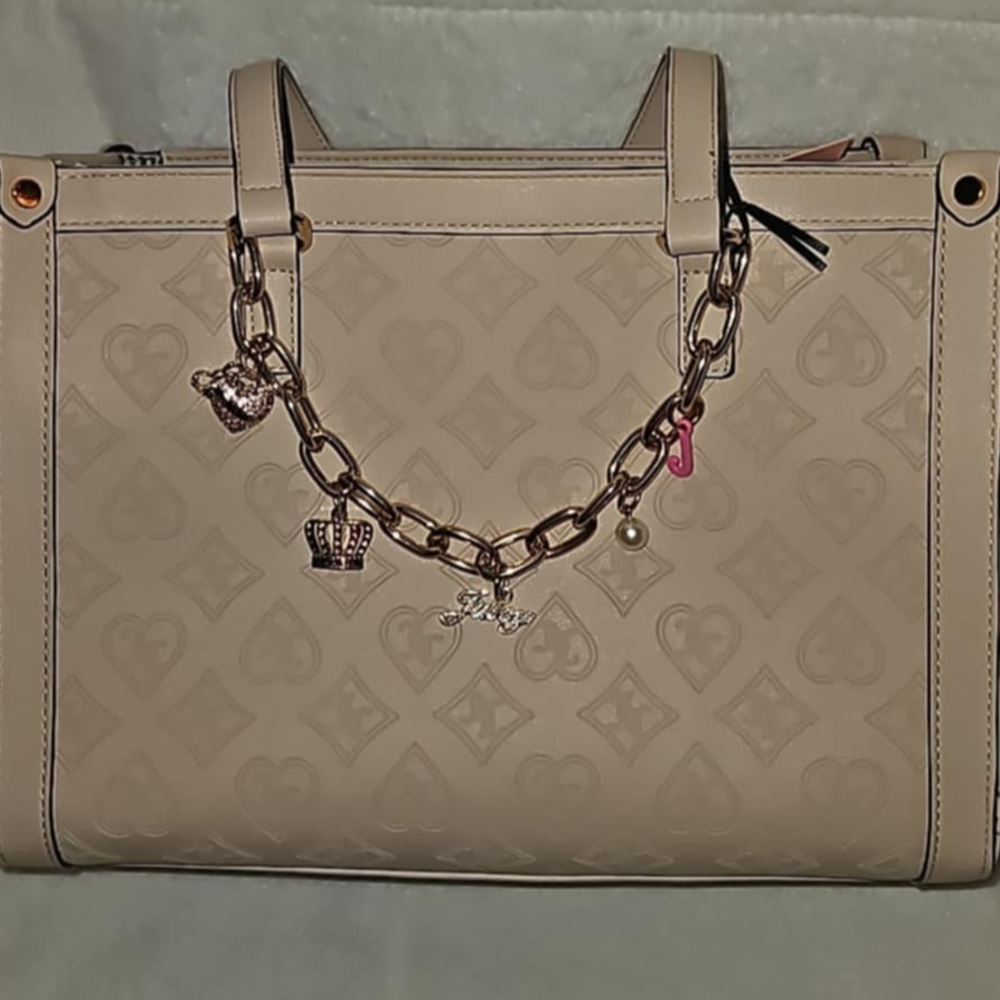 SOLD.           Juicy Couture Beige Tote with Chain  and Charm Accents